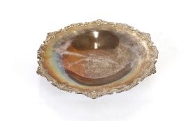 A mid-20th Century silver pedestal dish, by Adie Bros., having foliate shaped border and central