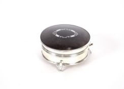 A circular silver and tortoiseshell trinket box, by Cooper Bros. Birmingham 1912, 8cm dia.