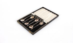 A cased set of six silver classical teaspoons, including Acanthus knop, Wrythen knop, and Seal