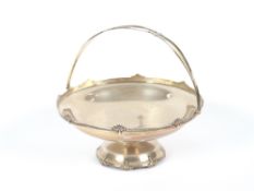 A silver swing handled fruit basket, by Walker & Hall, Sheffield 1936, 25cm dia. x 11cm high,