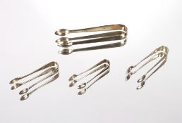 Four various silver sugar tongs, 87.5gms
