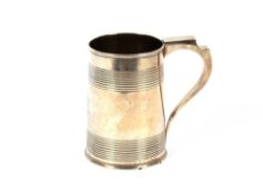 A George III silver tankard, of cylindrical tapering form with ring banded decoration and angular