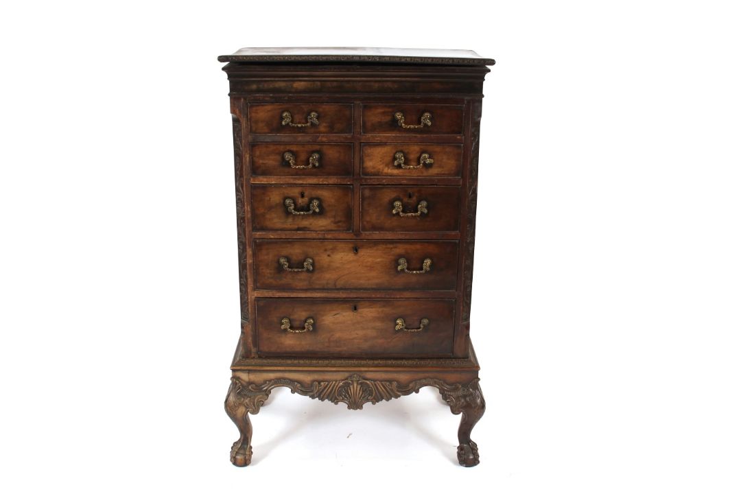 A good quality George III style mahogany chest,  on stand, having fold over top, fitted six short