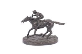 A bronze figure of a horse and jockey, after Mene, 28cm long x 20cm high