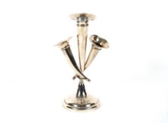 A three branch silver epergne, Birmingham 1910, loaded base, 18cm high