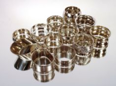 A collection of twelve various silver napkin rings, 181gms