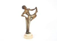 Josef Lorenzl, cold painted bronze figure of a dancing girl, signed, on a stepped marble plinth,