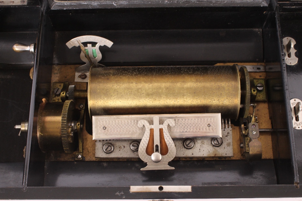 A rosewood cased and inlaid Swiss music box, playing ten airs, 60cm wide x 29cm deep x 19cm high - Image 3 of 3