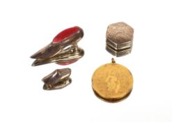 A silver gilt medallion,  with inscription 'My True Love Sent To Me A Partridge In A Pear Tree'; a