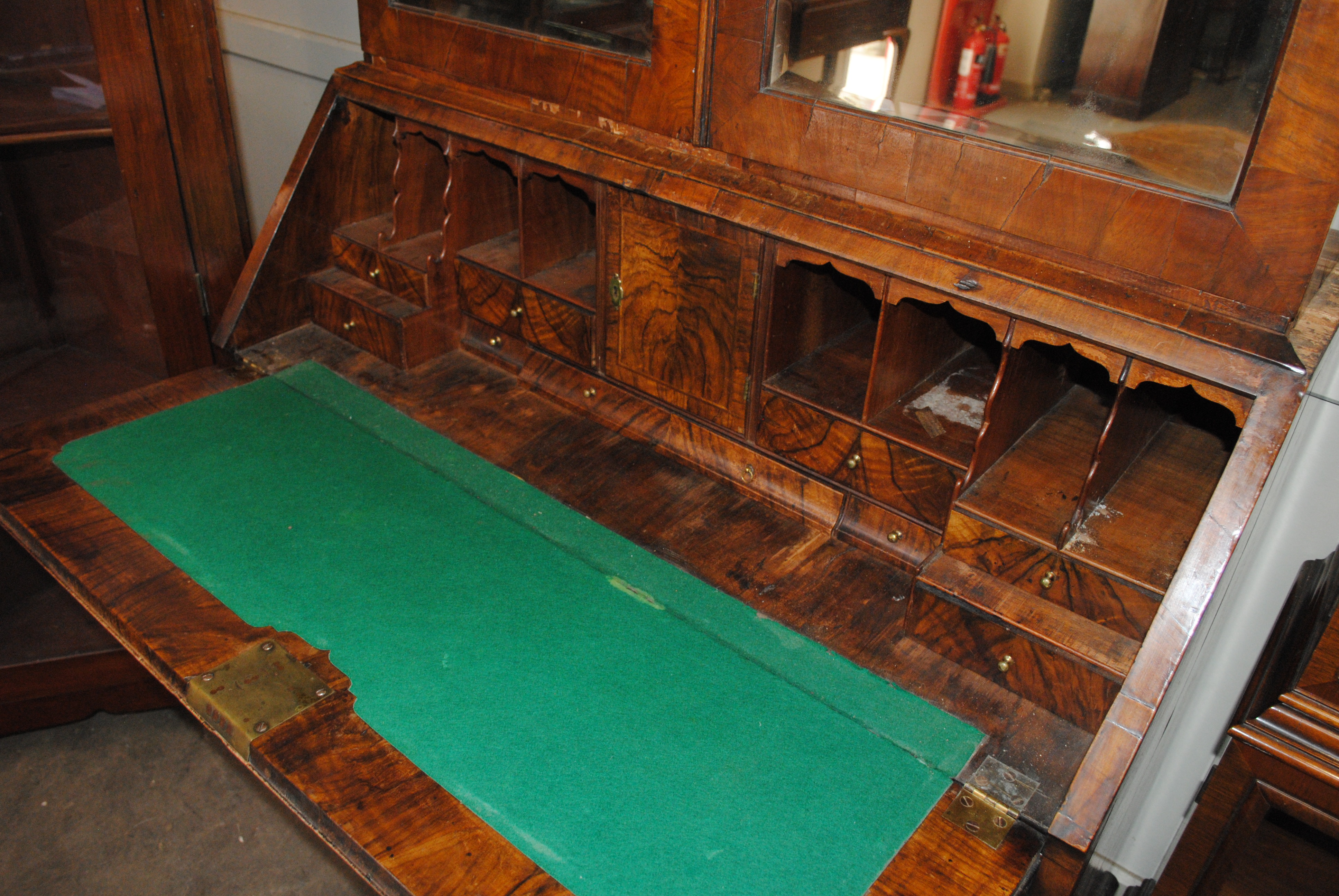 An 18th Century walnut bureau bookcase, the upper section fitted pigeonholes and shelves enclosed by - Image 5 of 7