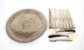 An Eastern white metal tray, the border with animal decoration; a pair of mother of pearl and