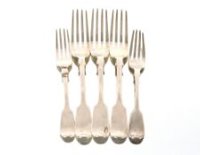 Three Victorian silver dinner forks, crested, London 1856; a matching dessert fork; and another,