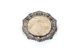 A small silver presentation card tray, bearing inscription within a pie crust and shell decorated