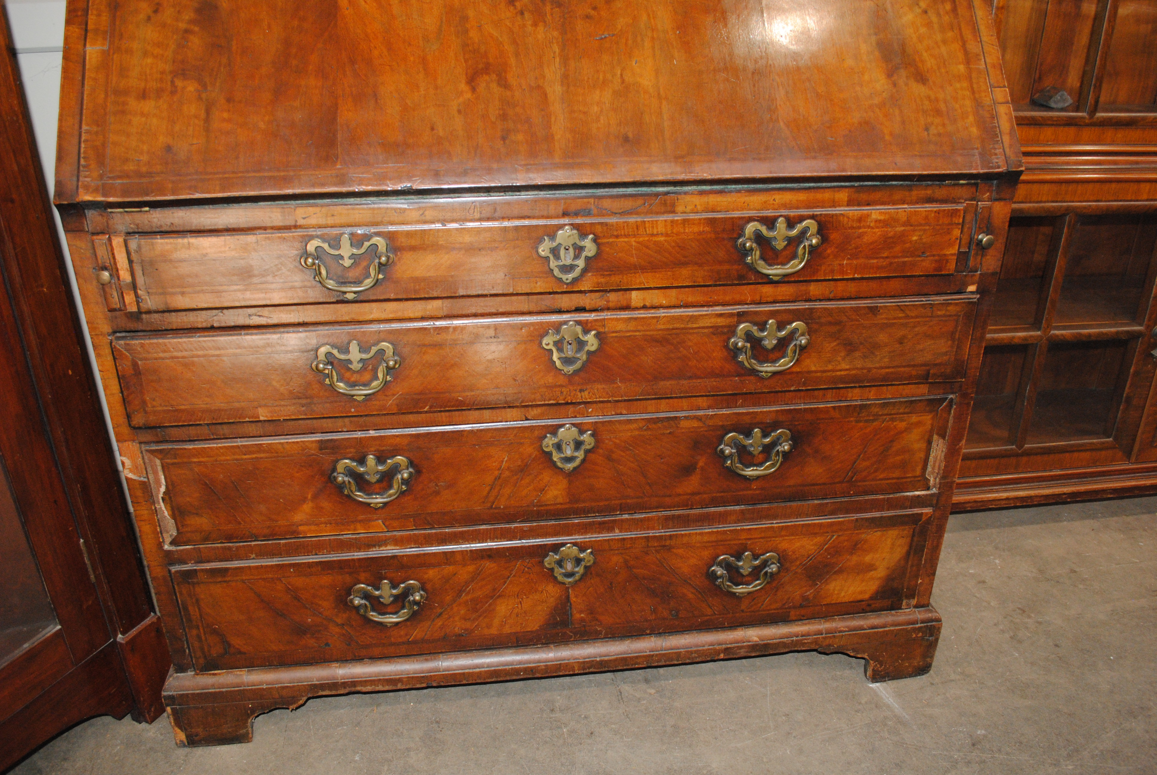 An 18th Century walnut bureau bookcase, the upper section fitted pigeonholes and shelves enclosed by - Image 7 of 7