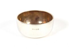 A small circular silver bowl, Birmingham 1930, 10.5cm dia. x 5cm high, 107.3gms