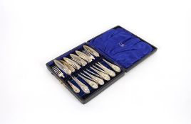 A cased set of six each silver butter knives and cake forks, by Walker & Hall, Sheffield 1908,