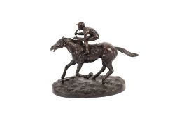 A bronze figure of a horse and jockey, after Mene, 26cm long x 22cm high
