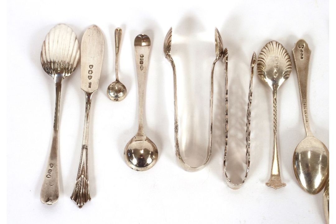 A small collection of various silver teaspoons, condiment spoons, sugar nips and a butter knife, - Image 4 of 6