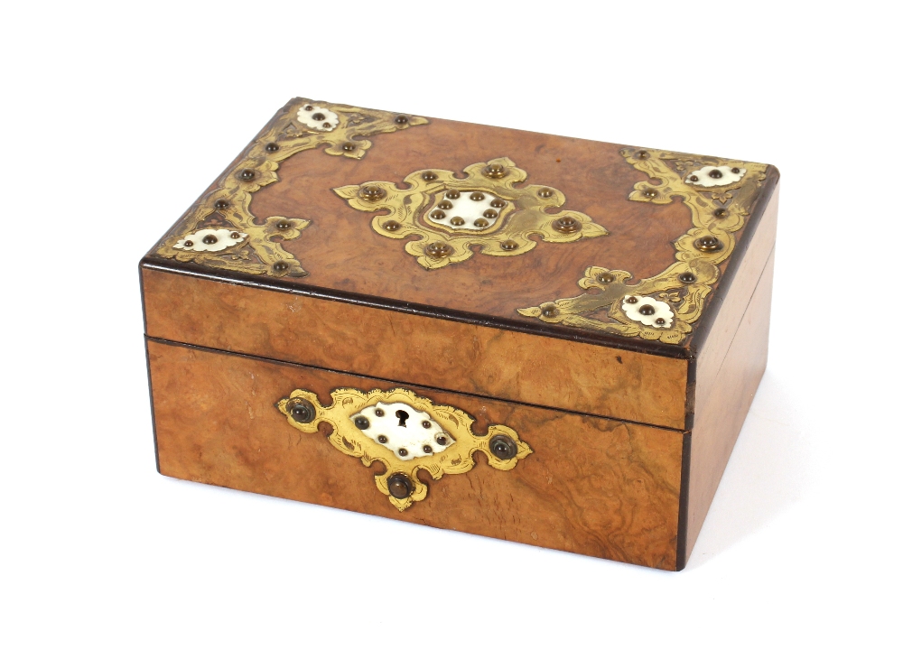 A 19th Century mahogany velvet lined storage box, fitted sunken brass handles, complete with key,