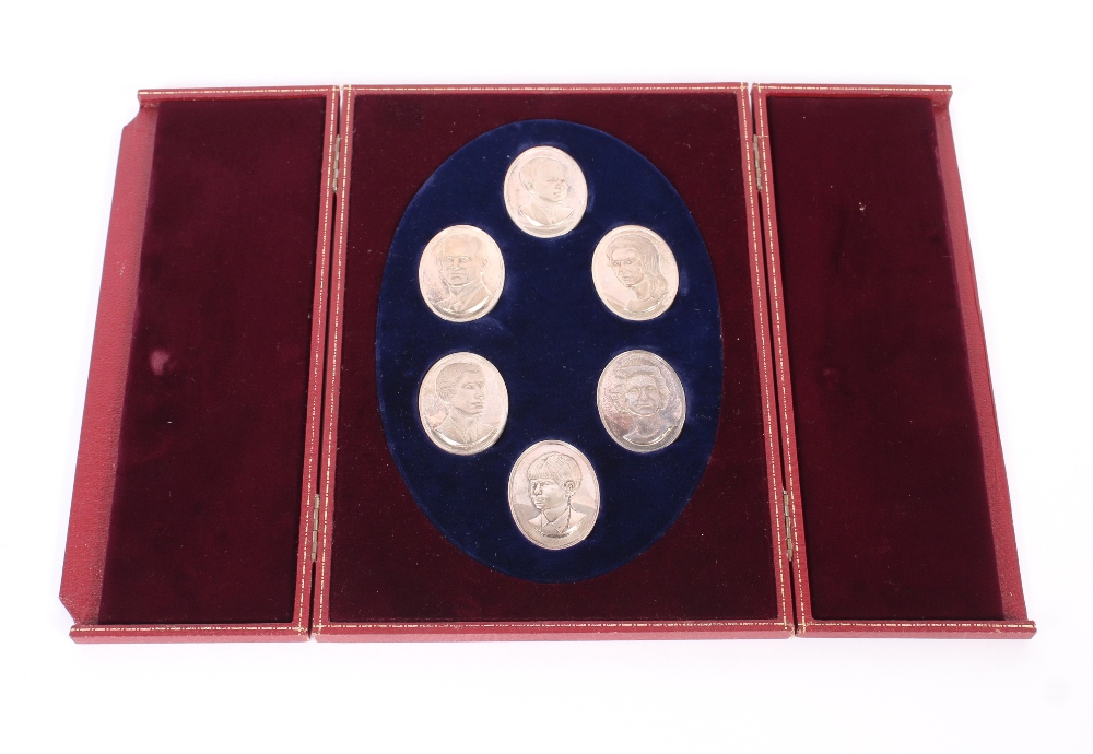 A cased set of six silver medallions depicting The Royal Family, London 1972, 5cm x 4cm, 267gms