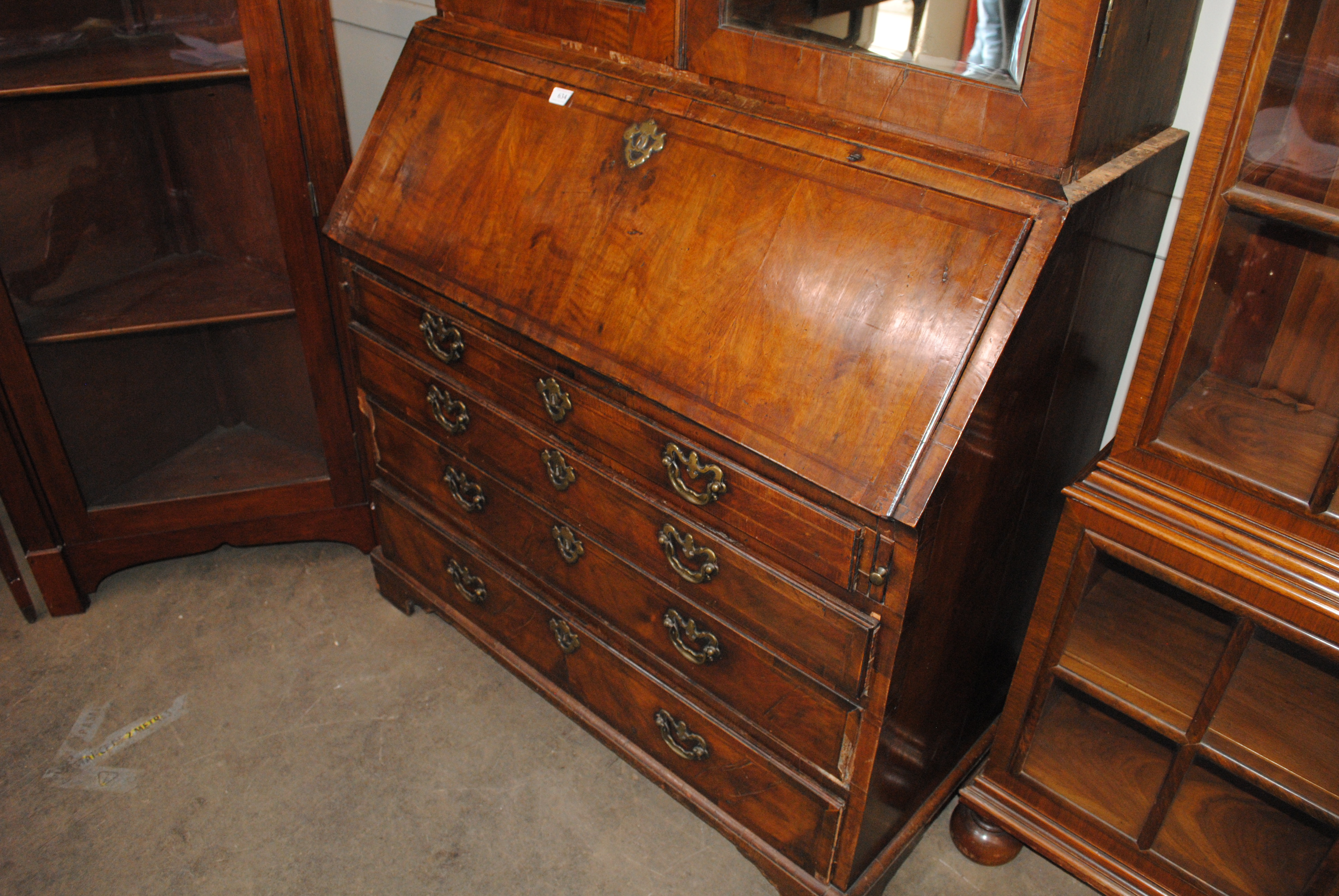 An 18th Century walnut bureau bookcase, the upper section fitted pigeonholes and shelves enclosed by - Image 2 of 7