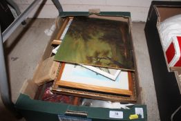 A box containing miscellaneous pictures