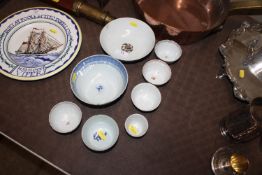 A collection of Chinese tea bowls and larger bowls