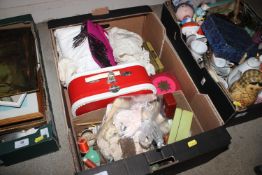 A box containing miscellaneous sewing items