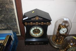 A Victorian marble cased eight day mantel clock