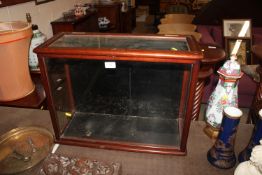 An Edwardian mahogany display case