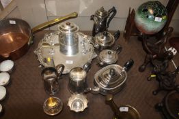 A large plated salver, an oval plated biscuit barr