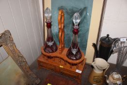 A satin wood and ebony strung decanter stand fitte