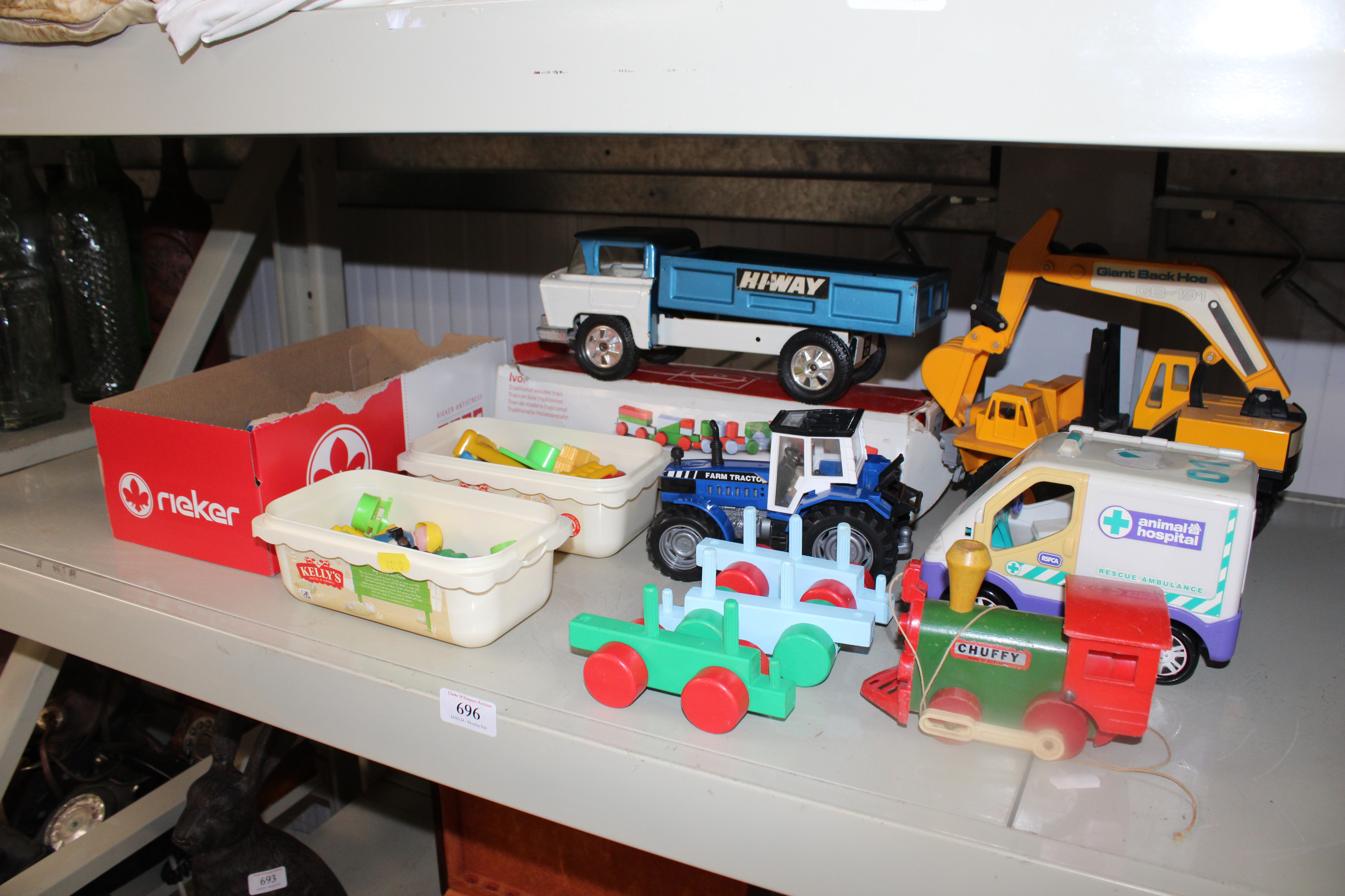 A collection of model vehicles; a Habitat wooden t