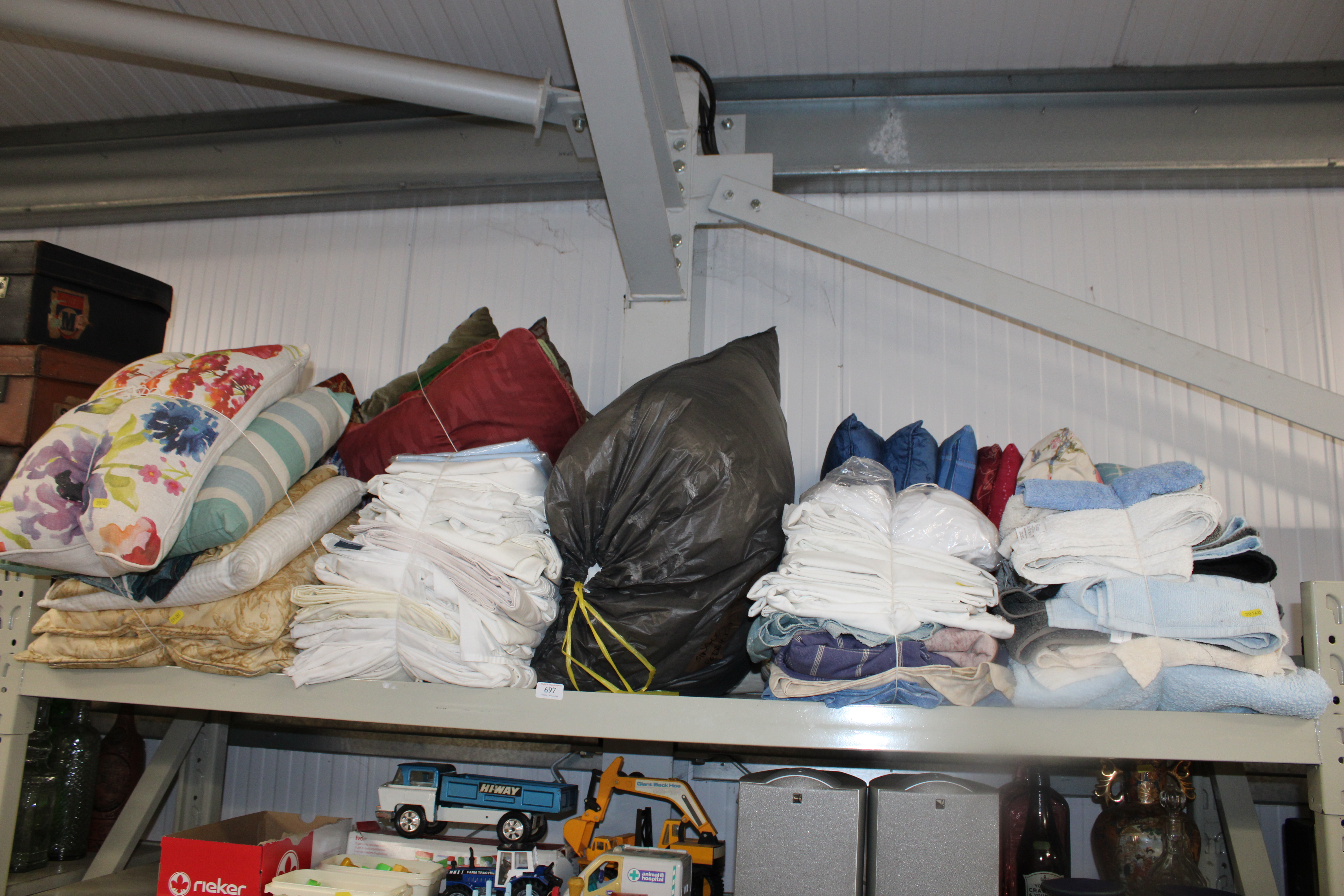 A large quantity of linen, cushions, towels etc.