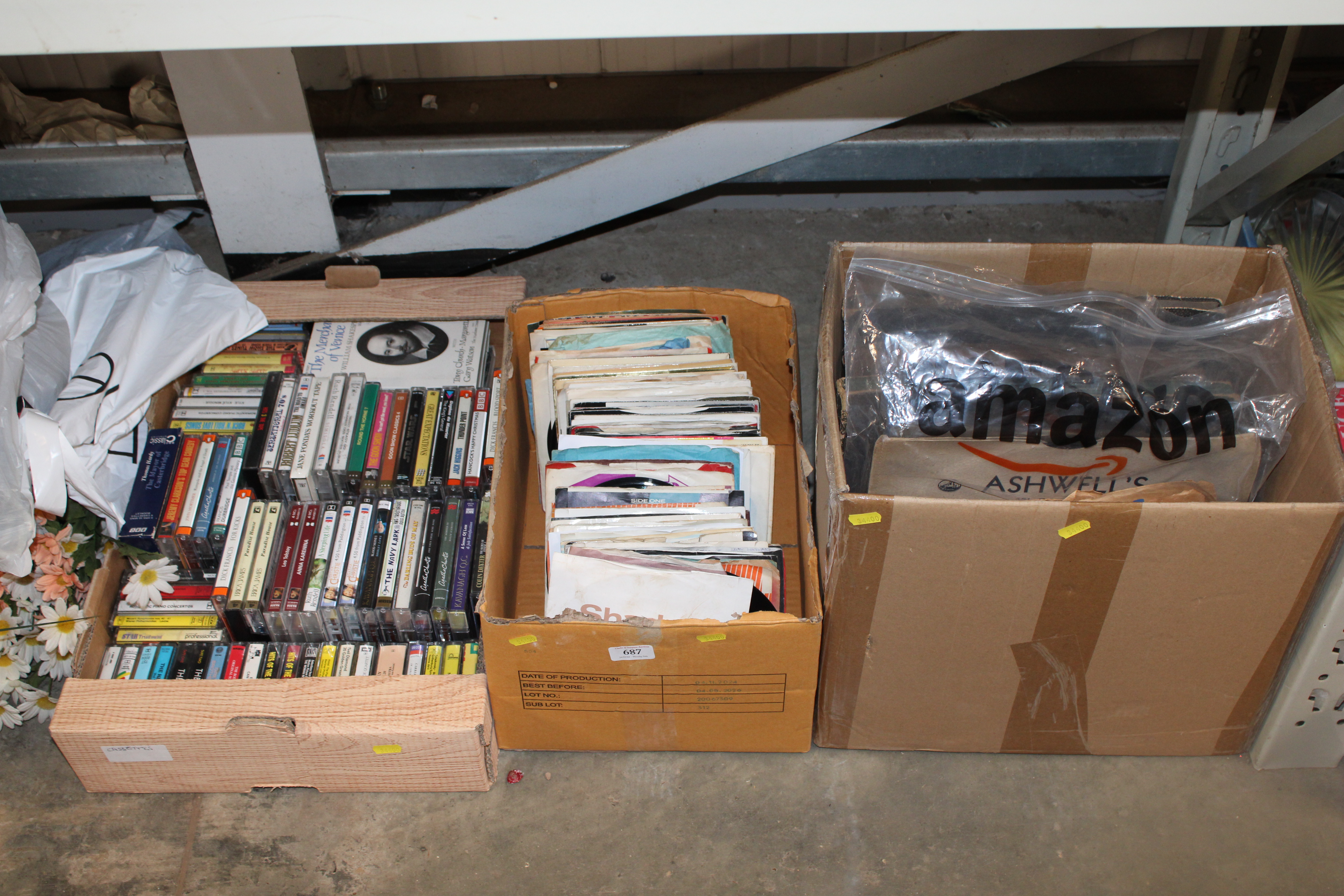 Three boxes containing various records and cassett