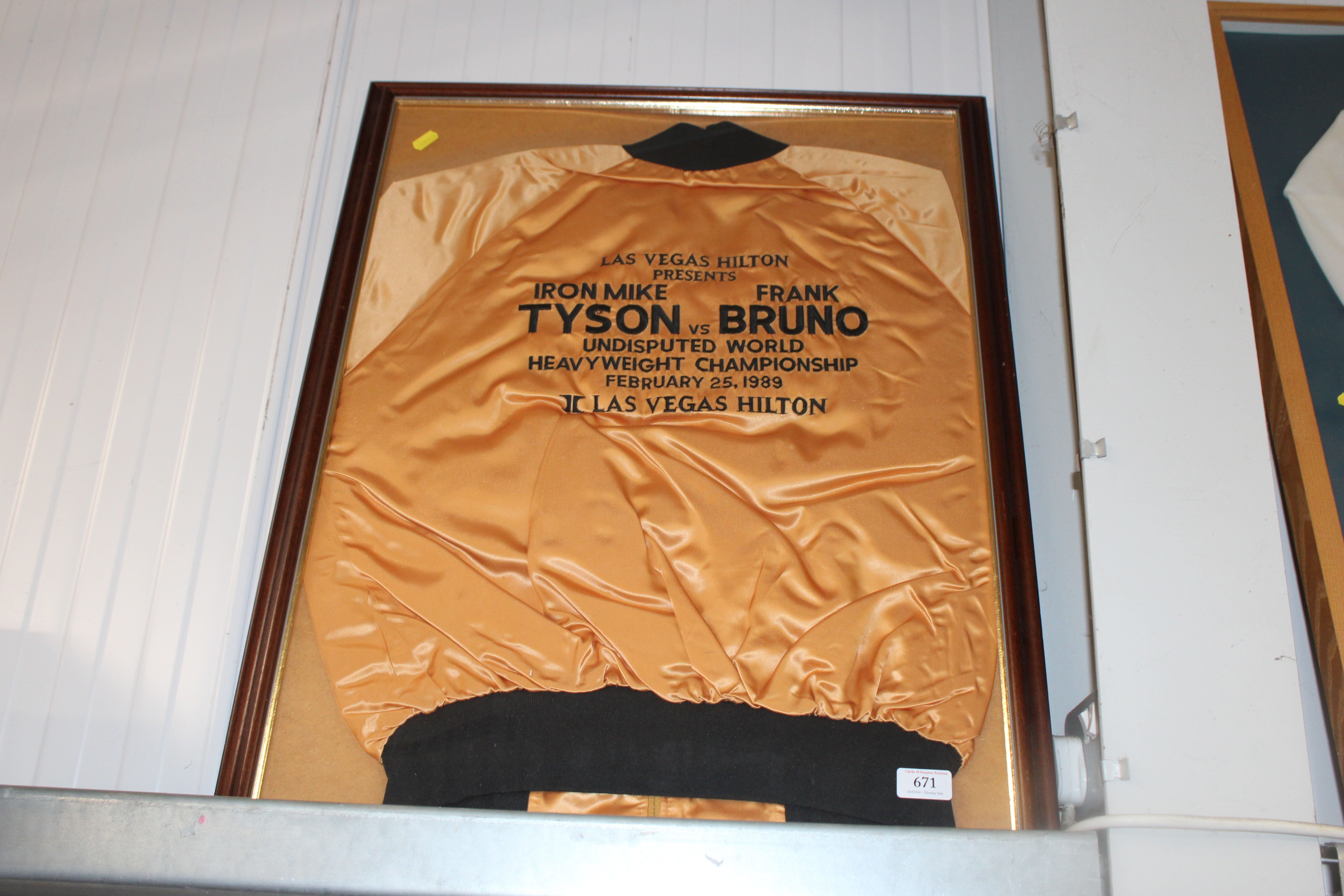 A Mike Tyson vs Frank Bruno framed jacket