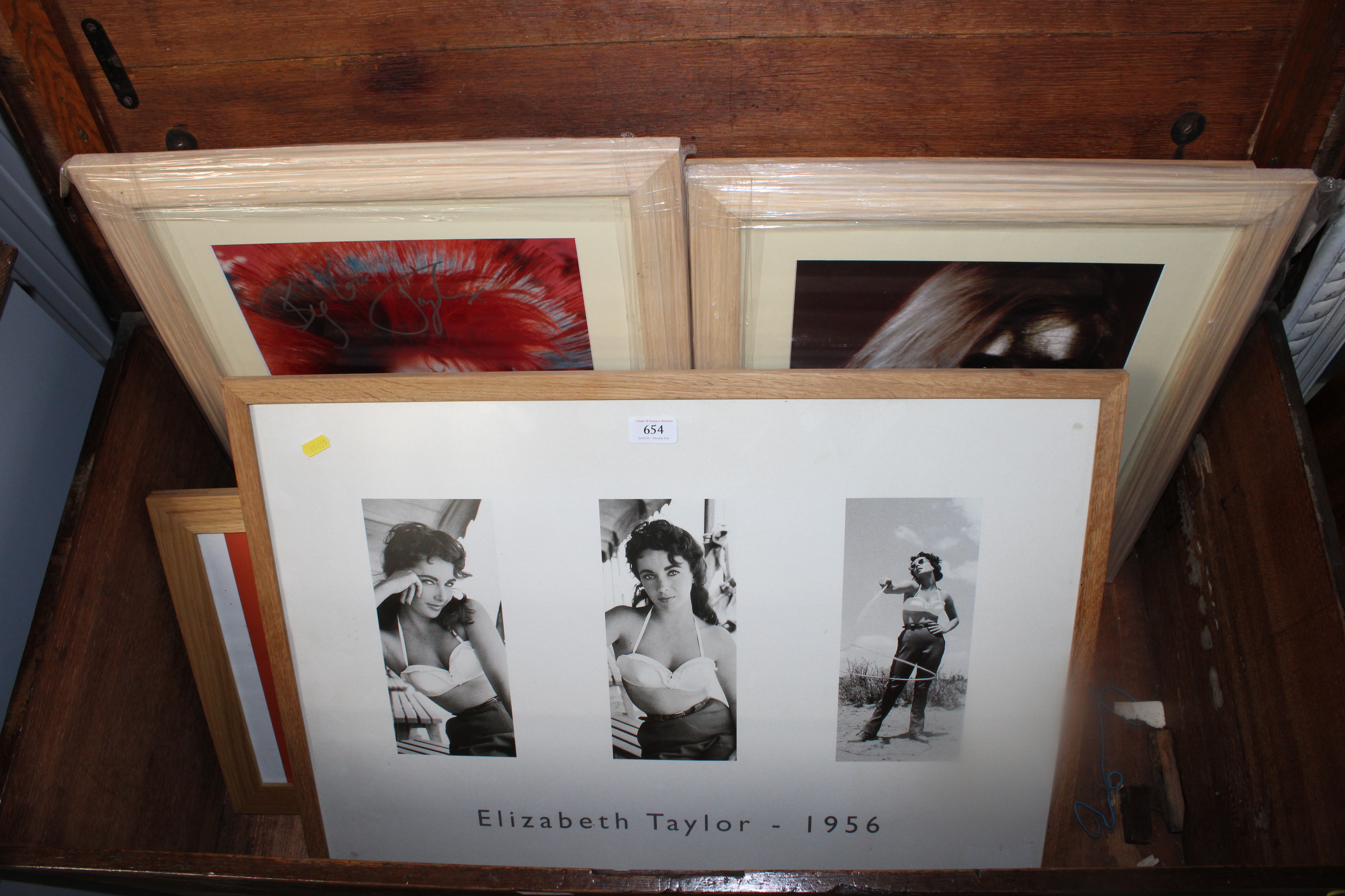 An Elizabeth Taylor 1956 framed poster, together w