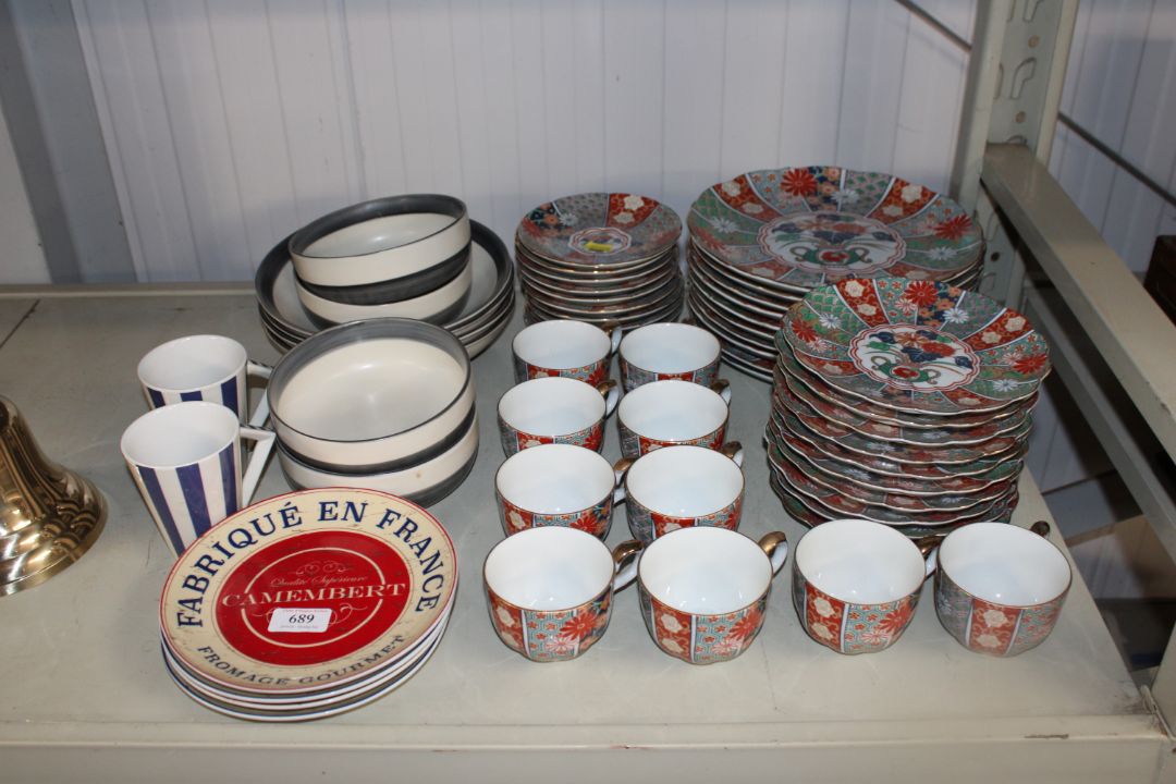 A collection of Arita 'Imari Fan' tea and dinner w