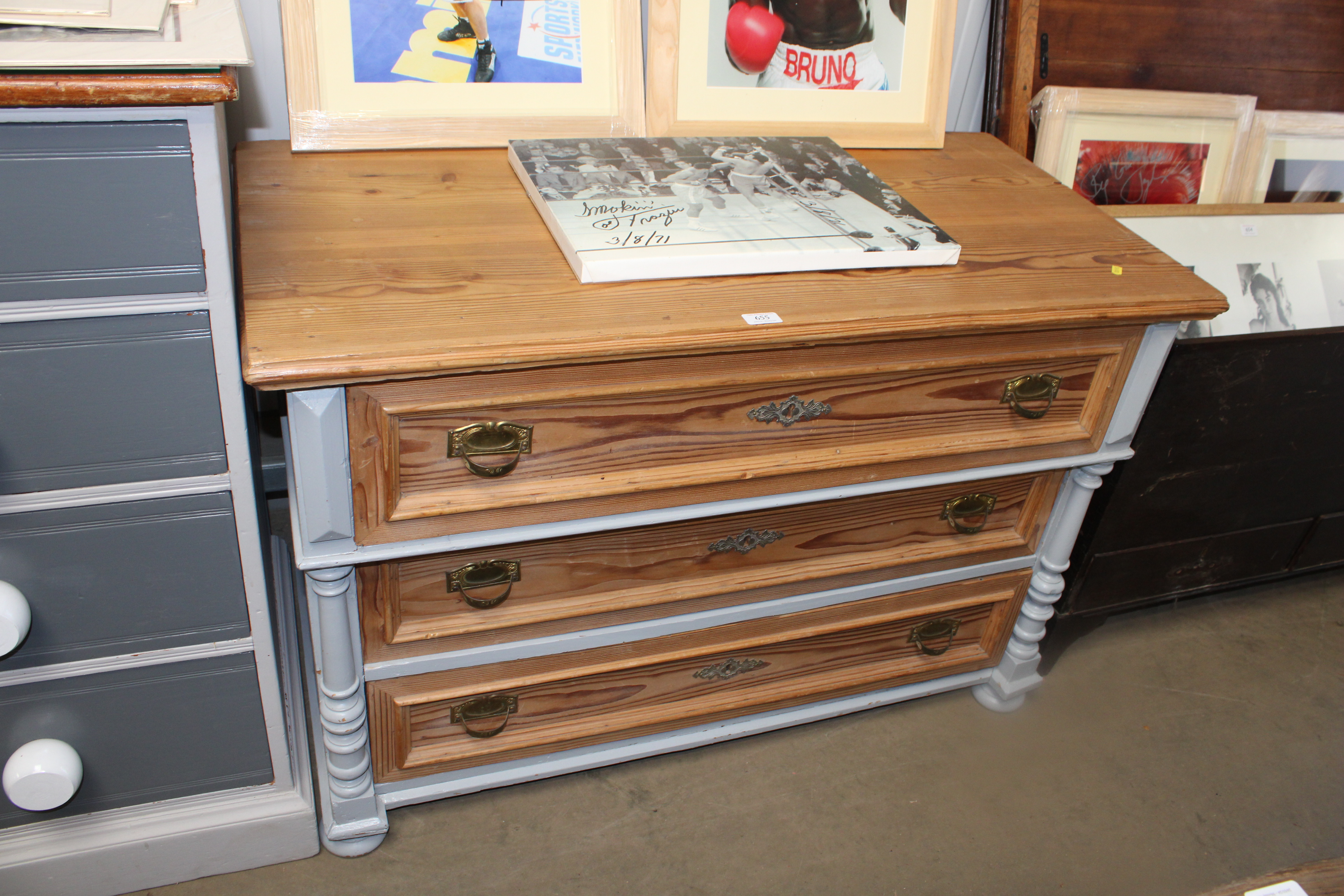 A part painted pine chest fitted three long drawers with brass handles