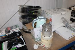 A Tefal steamer; a blender and a kettle
