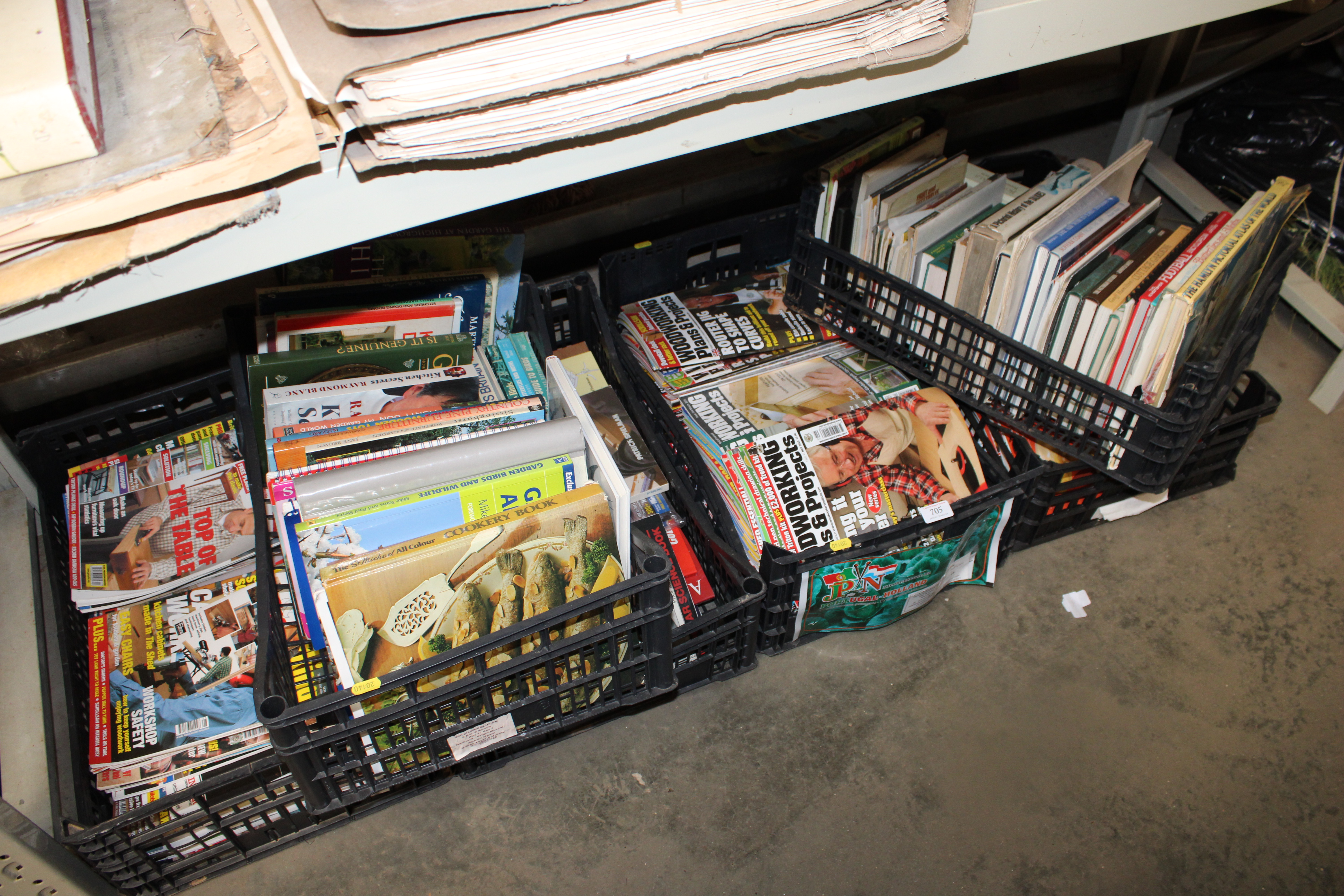 Six boxes containing various books and magazines