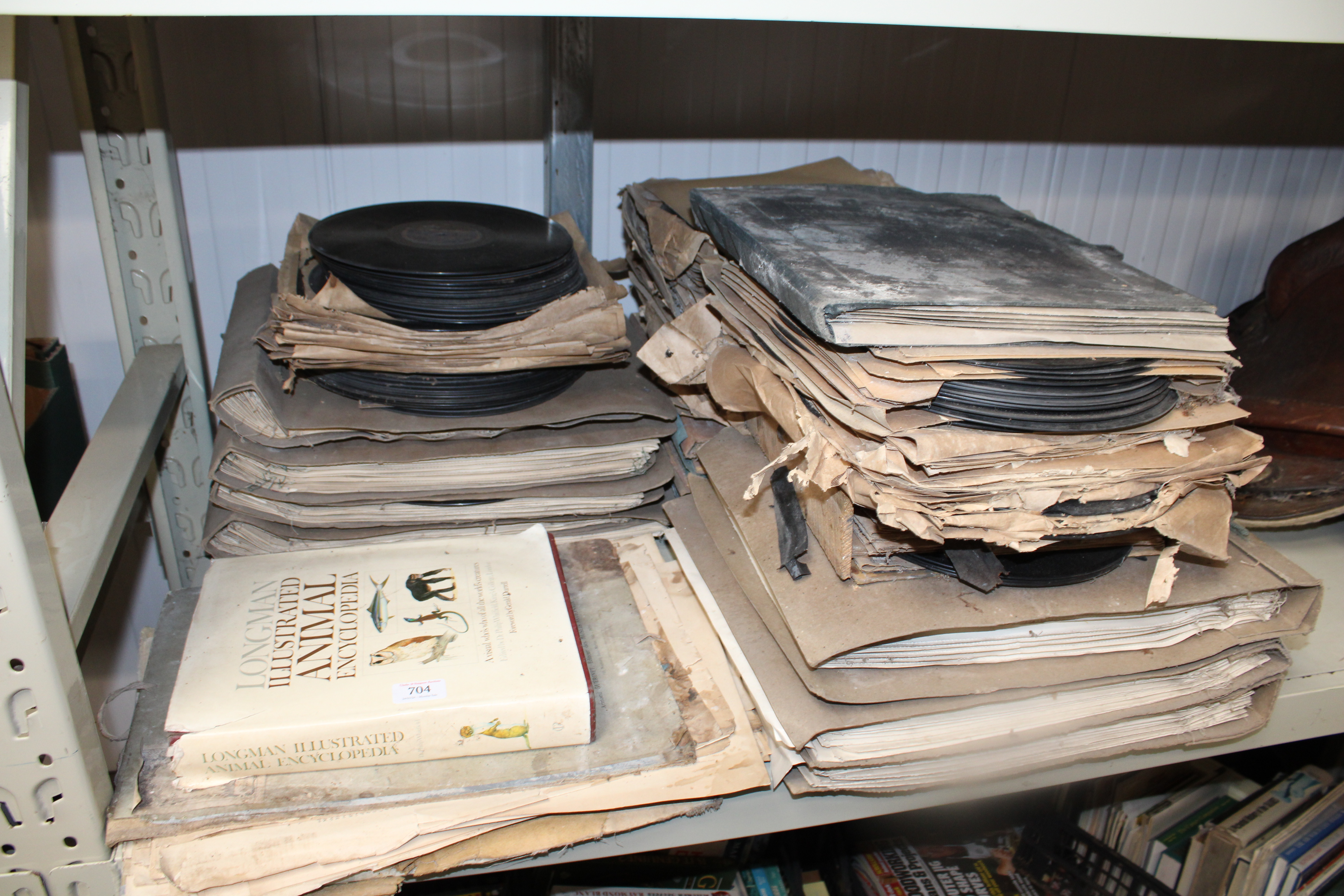 A collection of various records and a Longman Illu