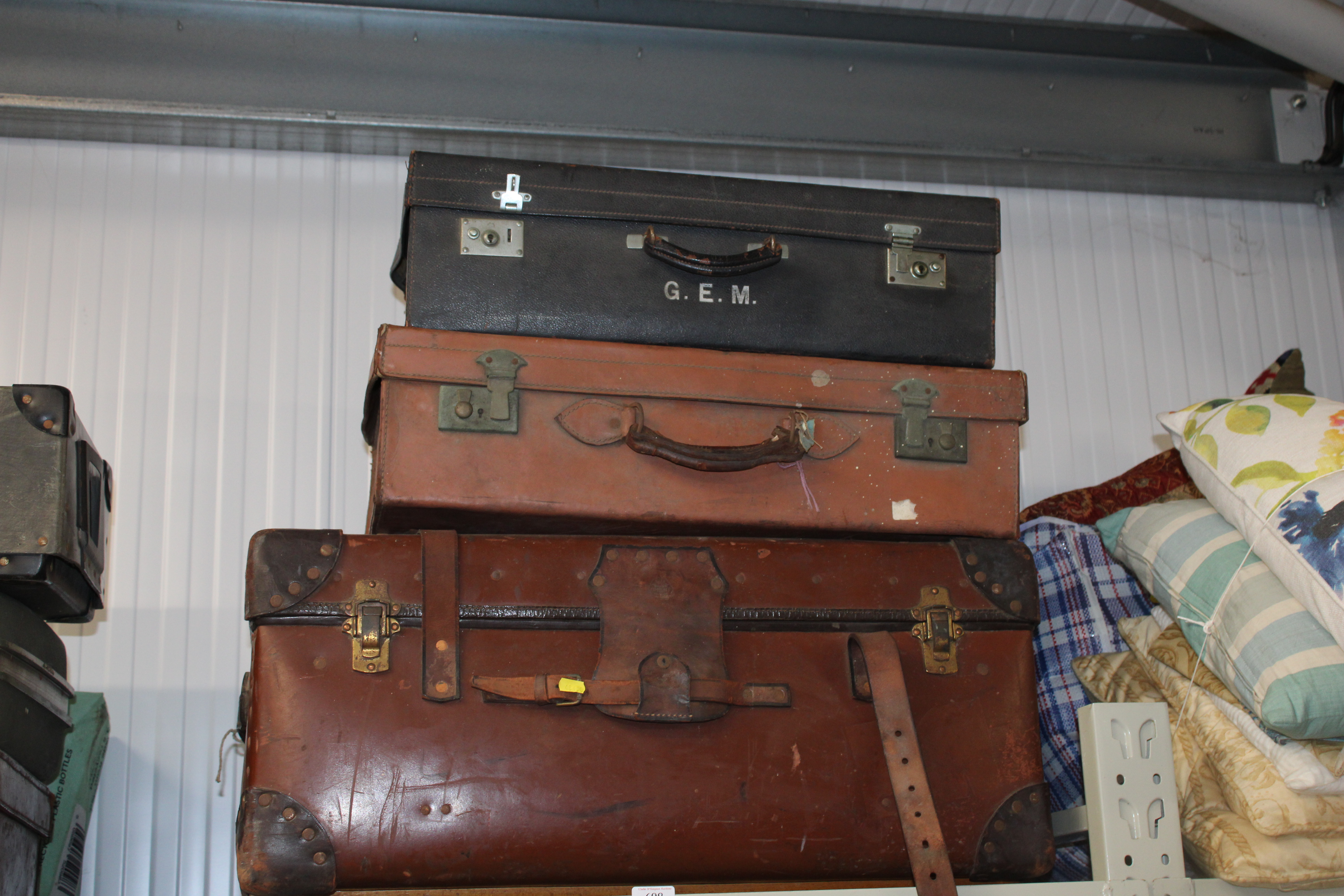 Three vintage suitcases