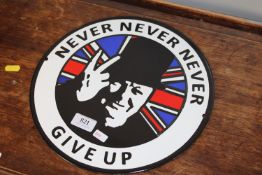A reproduction, Never Give Up' advertising sign (214)
