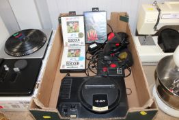 A Sega Mega Drive together with various accessorie