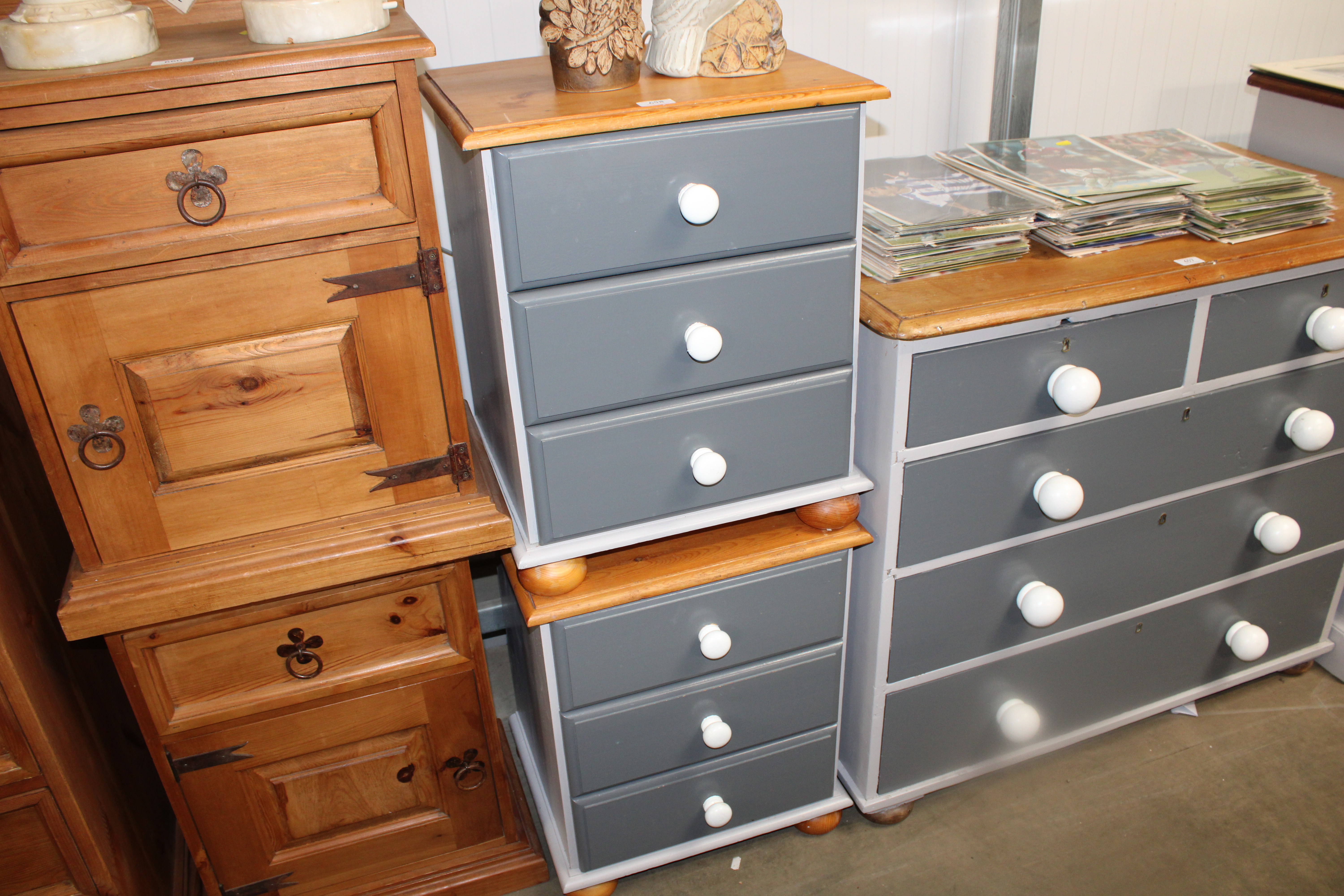 A pair of part painted pine bedside chest fitted t
