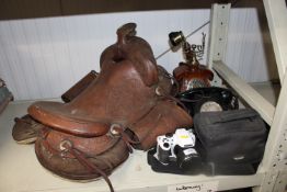 A rotary dial telephone; a wooden telephone; a Fuj