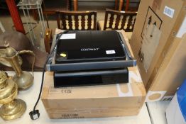 A Costway panini press