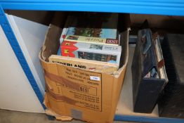 A box containing various puzzles, unknown if compl