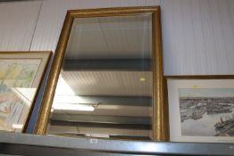 A gilt framed and bevel edged wall mirror